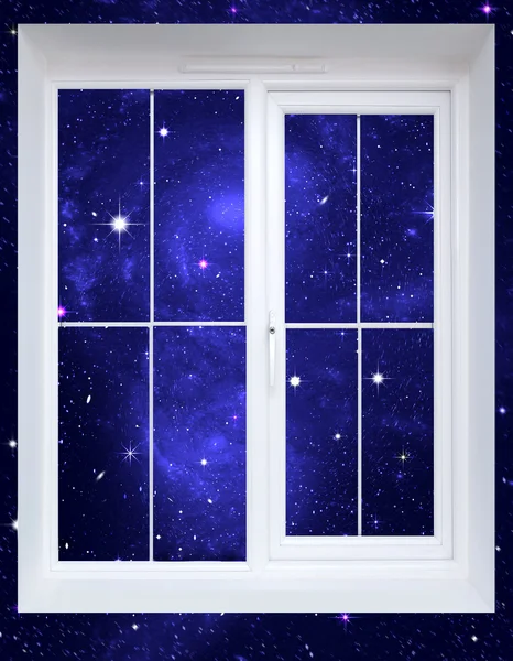 De sterrenhemel achter een venster — Stockfoto