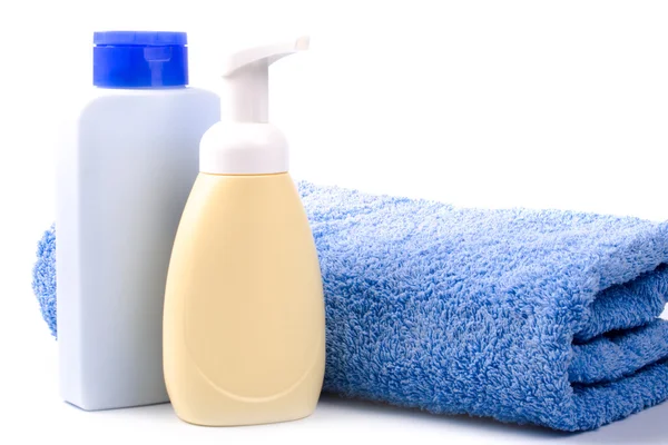 Body care products and towel — Stock Photo, Image