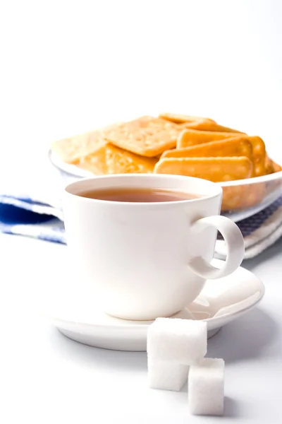 Tasse Tee, Zucker und Kekse — Stockfoto