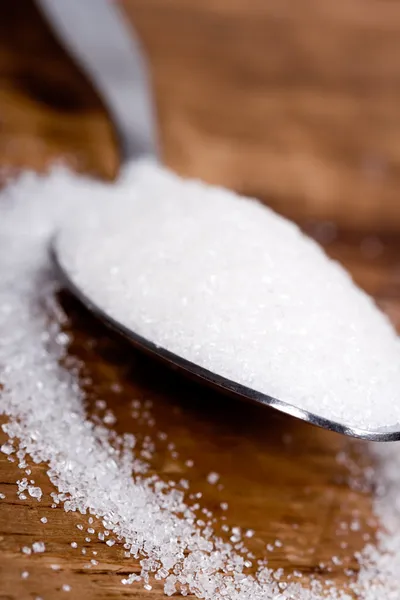 Spoon with sugar — Stock Photo, Image