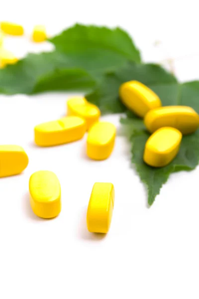 Желтые витамины — стоковое фото