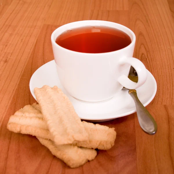Kopje thee en sommige cookies — Stockfoto