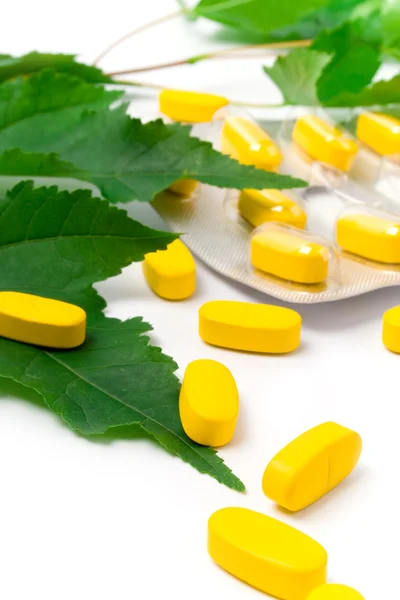 Yellow vitamin pills — Stock Photo, Image