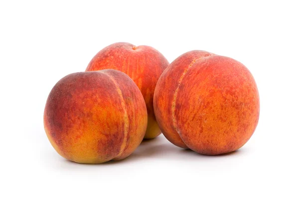 Tre persikor — Stockfoto