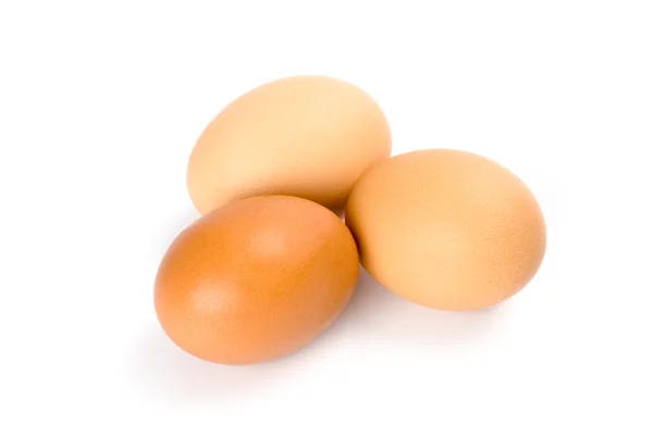 Tre uova marroni — Foto Stock