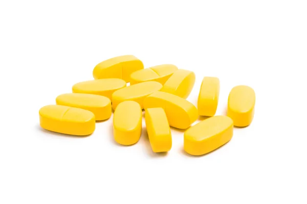 Gele vitamine pillen — Stockfoto