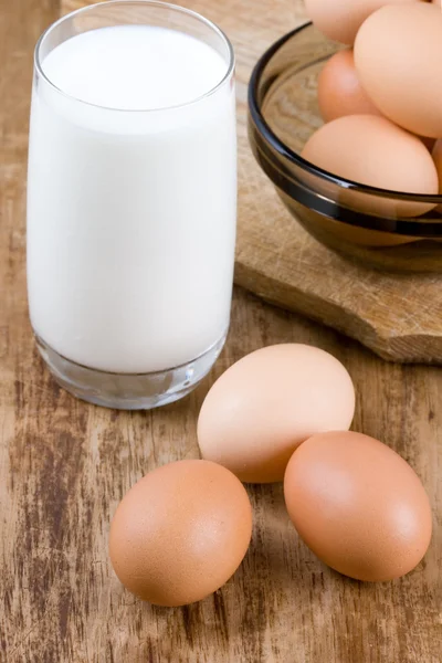 Eggs and glass of milk — Stock Photo, Image