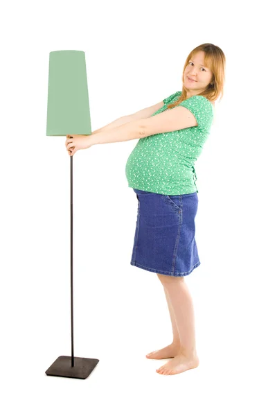 妊娠中の女性とランプ — ストック写真