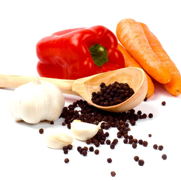 Carrots, red paprika, garlic and black pepper — Stock Photo, Image