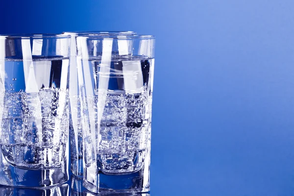 Three glasses with cold water — Stock Photo, Image