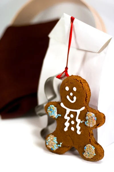 Gingerbread man and gift bag — Stock Photo, Image