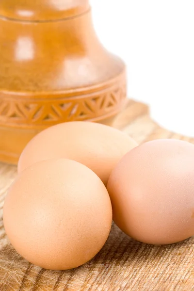Eggs and wooden box — Stock Photo, Image