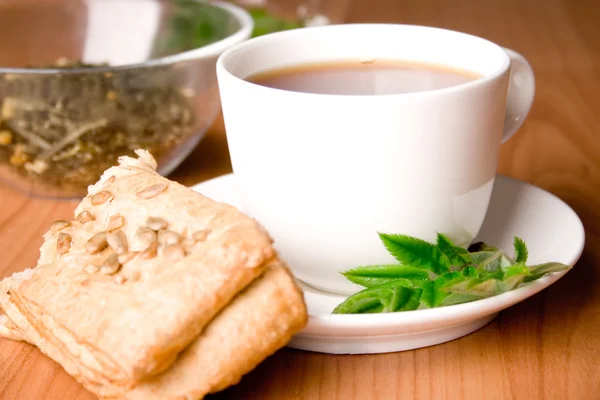 Black tea with herbs — Stock Photo, Image
