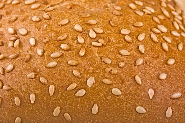 Chleb, rolki strewed przez sezam — Zdjęcie stockowe