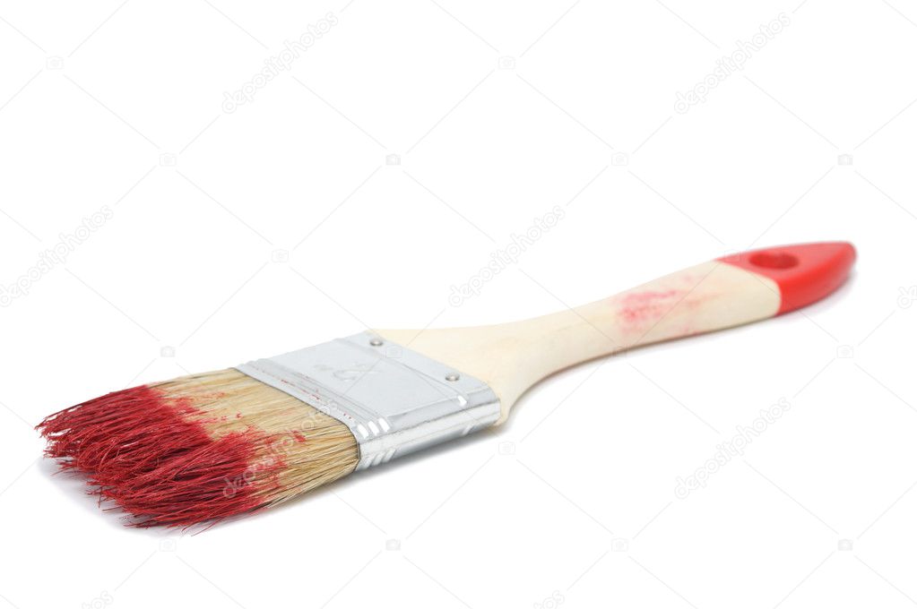 Painting brush with a red paint isolated
