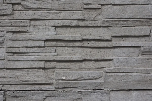 Stenen muur achtergrond en textuur. — Stockfoto