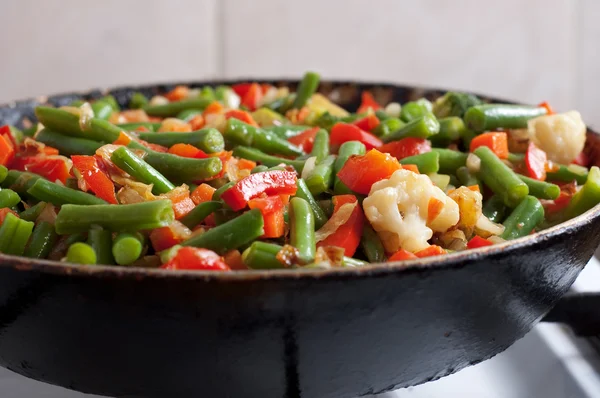 Close-up vegetables on a frying pan. — Stock Photo, Image