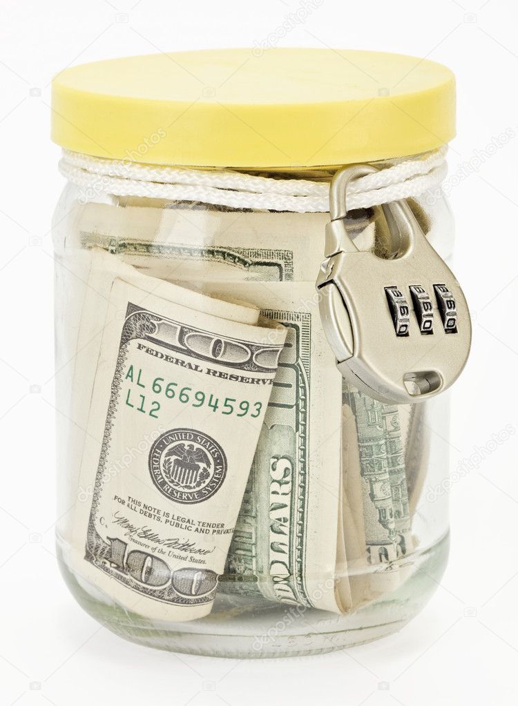 Many 100 US dollars in a glass jar