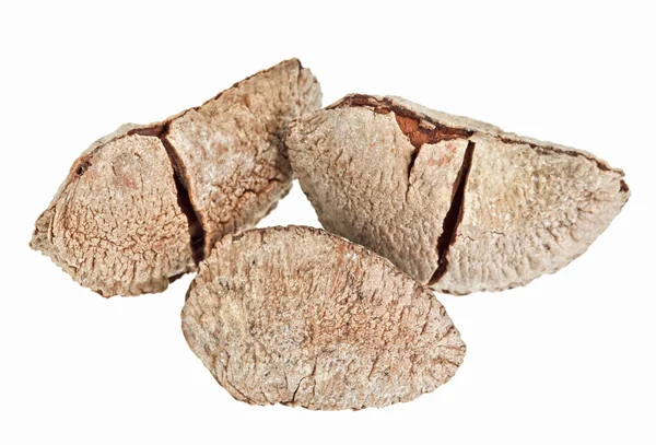 Few whole shelled Brazil nuts isolated on white — Stock Photo, Image