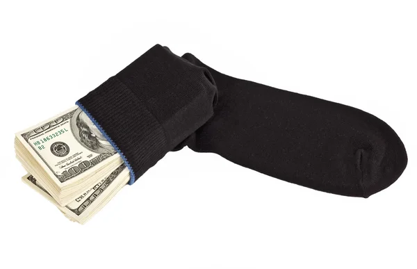 Paquete de dólares estadounidenses escondido en calcetín negro —  Fotos de Stock