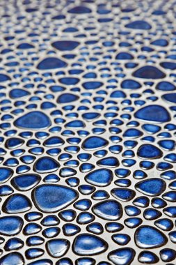 Floor with blue pebble mosaic pattern clipart