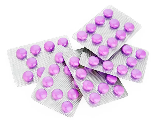 Таблетки в пузыре (пузырь) пакет изолированы на белом — стоковое фото