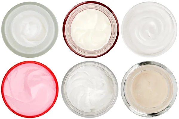 Set de 6 diferentes cremas dérmicas y geles aislados —  Fotos de Stock