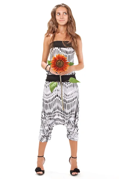 Young beautiful lady in harem pants with sunflower full-length s — Stock Photo, Image