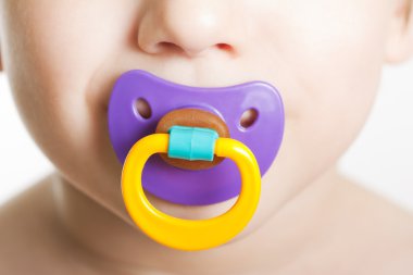 Child with baby pacifier clipart