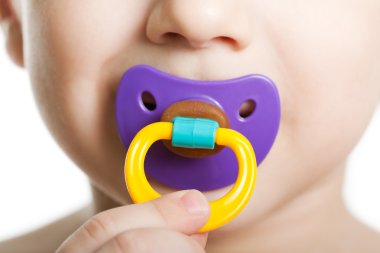 Child with baby pacifier clipart