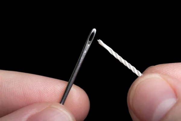 Sewing needle and thread — Stock Photo, Image