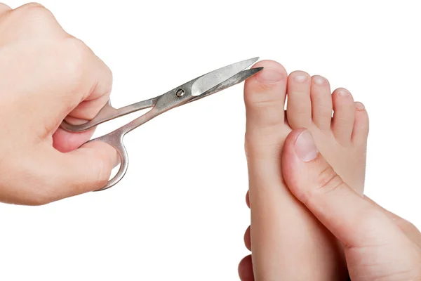 stock image Cutting child toenail