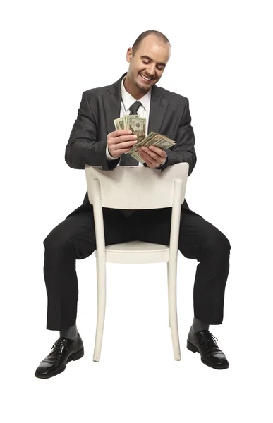 Sit businessman and money — Stock Photo, Image