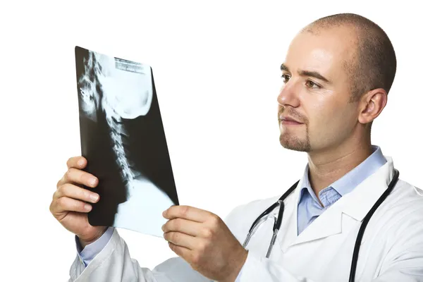 Jovem médico com filme de raios X — Fotografia de Stock