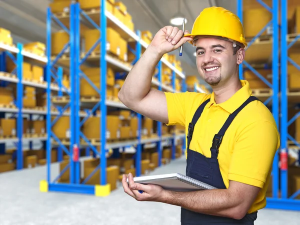 Smiling worker in warehouse — Stock Photo, Image