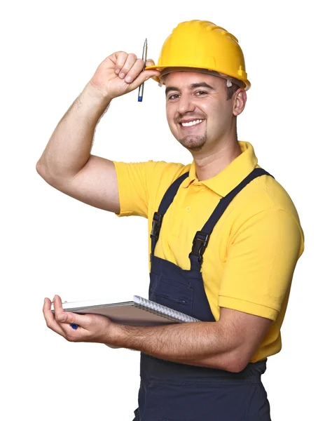 Smiling handyman with notebook — Stock Photo, Image