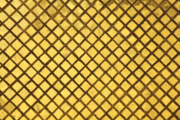 Золотая плитка — стоковое фото