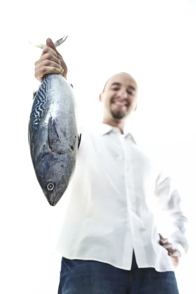 Muž s rybami — Stock fotografie