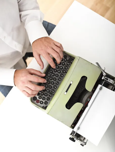 Man with vintage typewriter — Stock Photo, Image