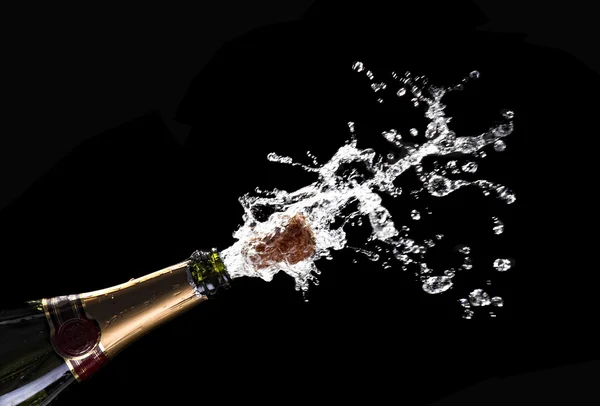 Champagne cork explosion Royalty Free Stock Images