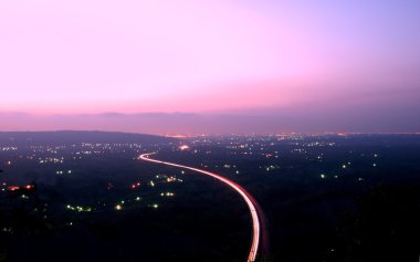 Aerial View of Highway at Dusk clipart