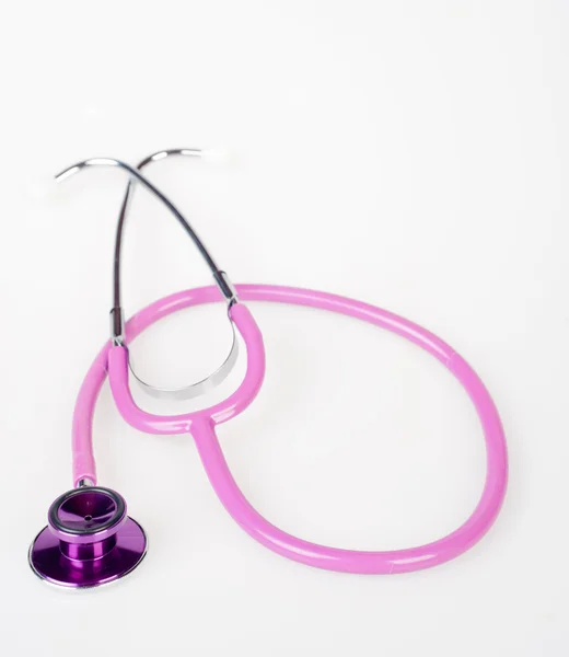 Roze stethoscoop op wit — Stockfoto