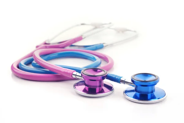 Roze en blauwe stethoscopen — Stockfoto