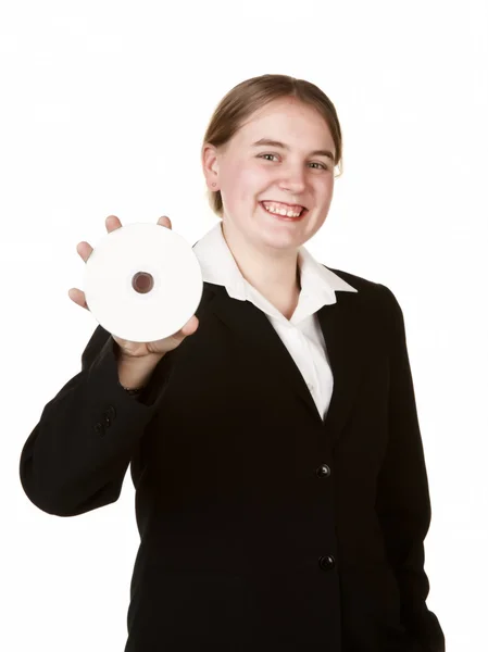 Business woman holding cd or dvd — Stock Photo, Image