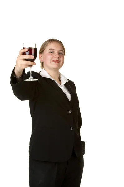 Joven mujer de negocios brindando con copa de vino — Foto de Stock