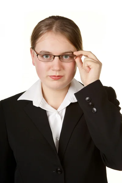 Jonge zakenvrouw glazen aanpassen — Stockfoto
