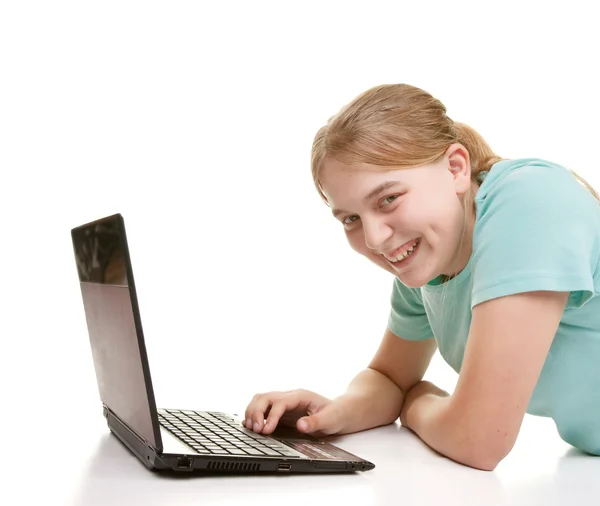 Teenager using a notebook — Stock Photo, Image
