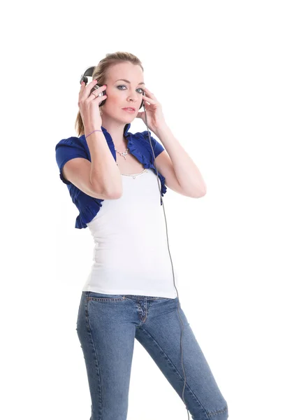 Young woman listening headphones — Stock Photo, Image