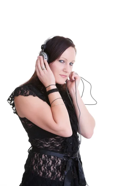 Fiatal nő zenehallgatás fejhallgató — Stock Fotó