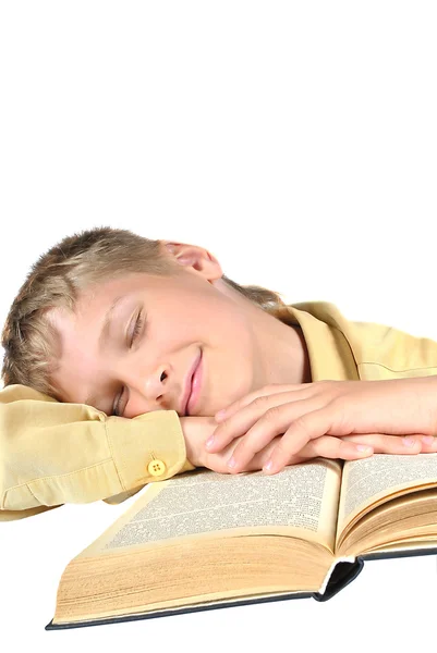 O adolescente adormeceu lendo um livro. Ensino secundário . — Fotografia de Stock
